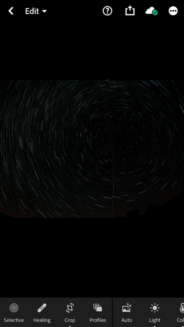 A screenshot of star trails in the Lightroom app