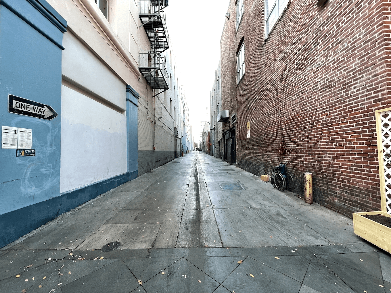 Ultra Wide shot of leading lines down an alleyway.