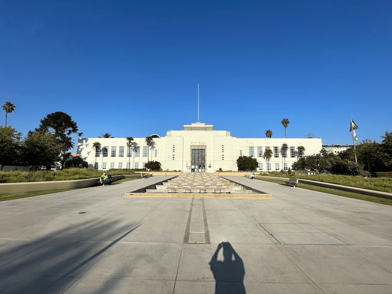 Ultra Wide shot of a building with shadows in frame.