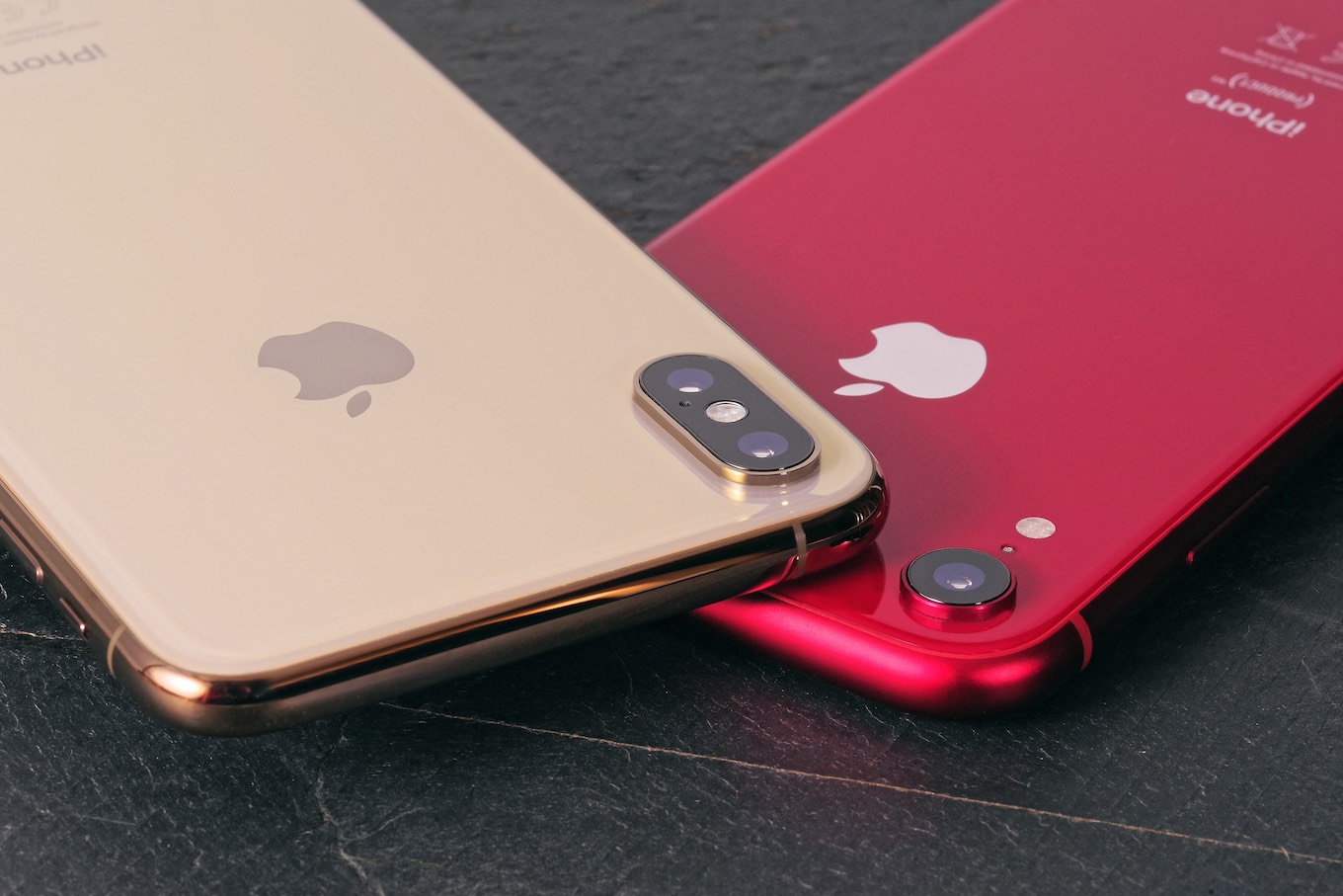 An iPhone XS and an iPhone XR side by side
