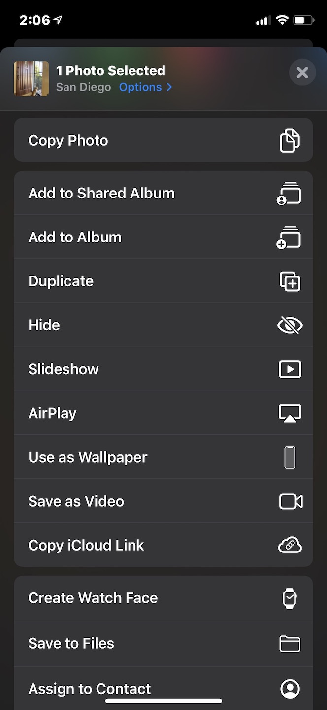 Screenshot showing how to save Live photos as videos via iOS 13