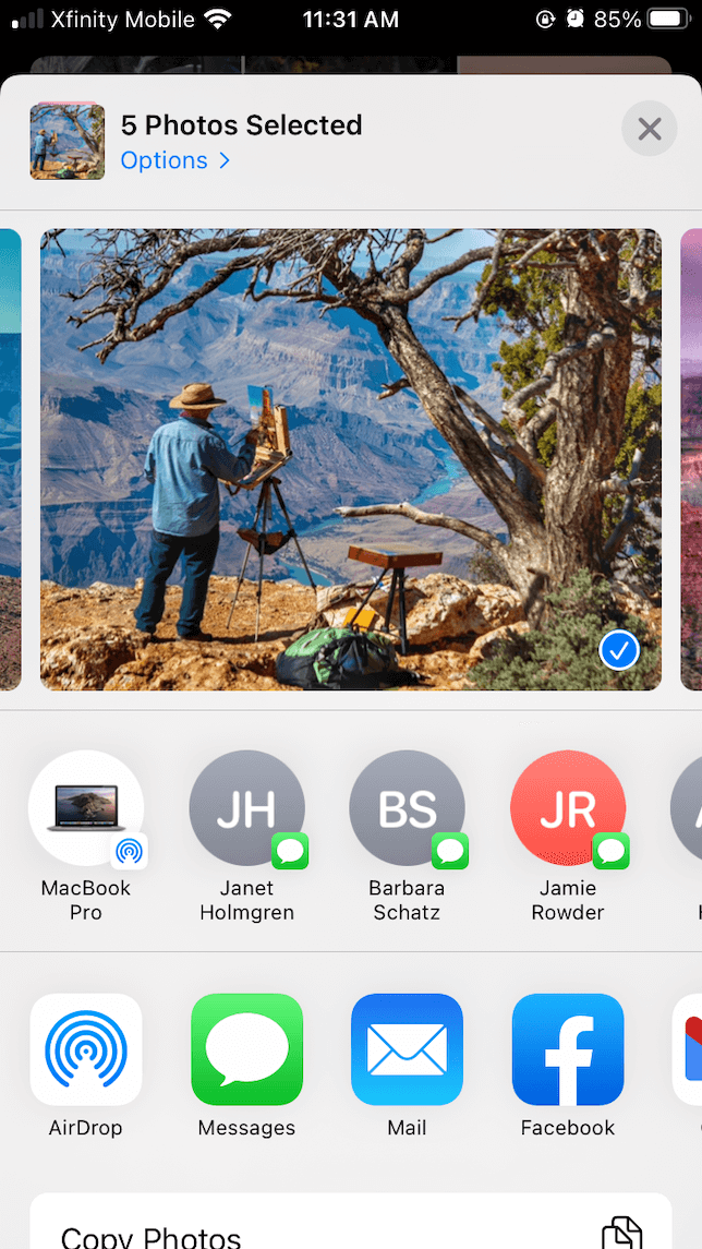 A screenshot demonstrating how to transfer photos from Air drop to Mac