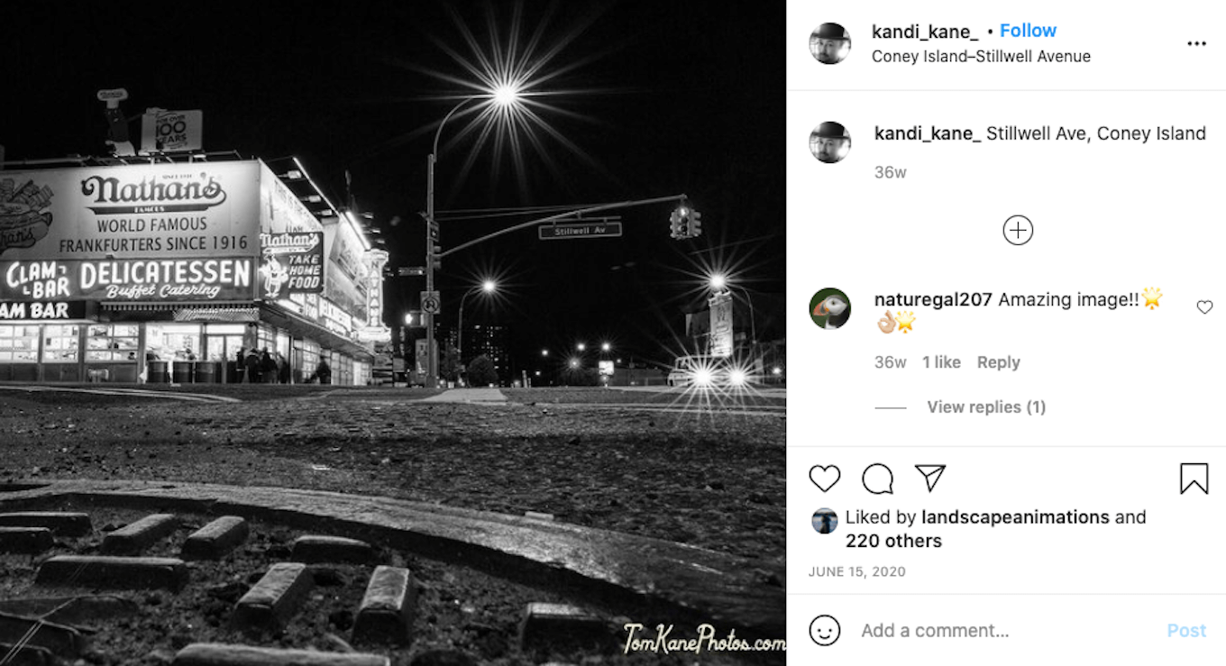 An Instagram screenshot featuring a black-and-white photo taken under artificial lights at night.