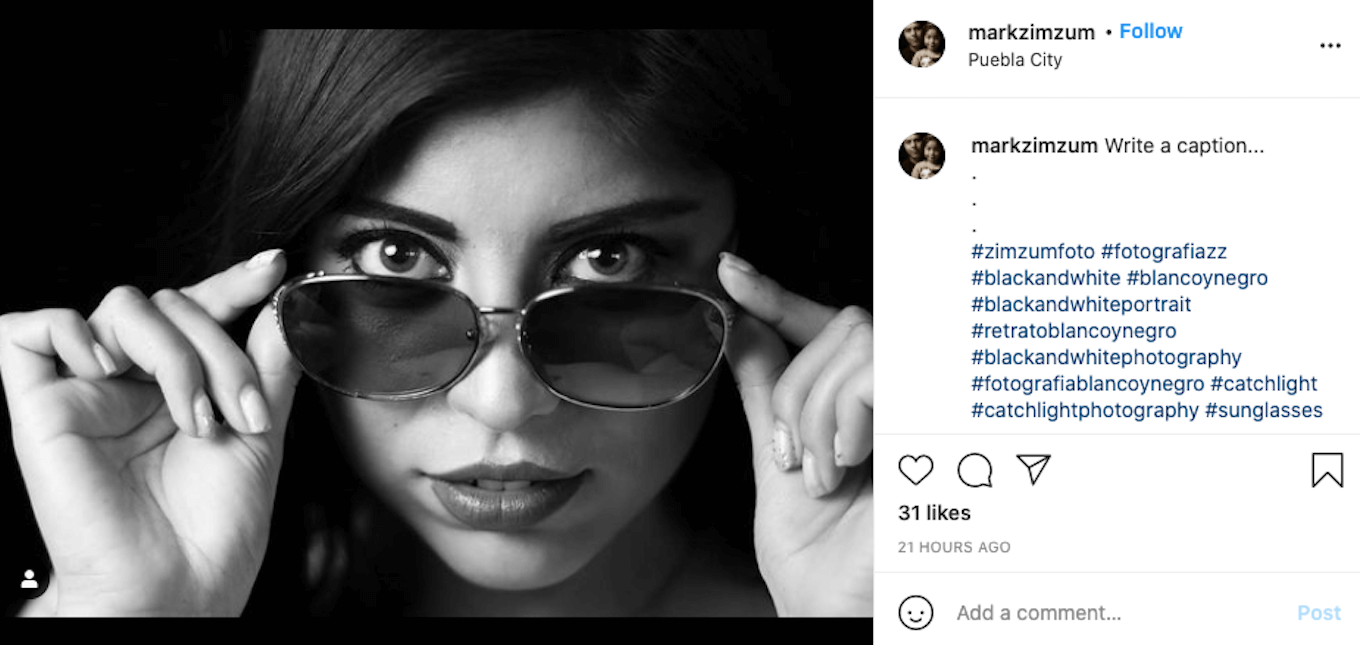 A black-and-white portrait from Instagram featuring a woman wearing sunglasses and looking straight at the camera.