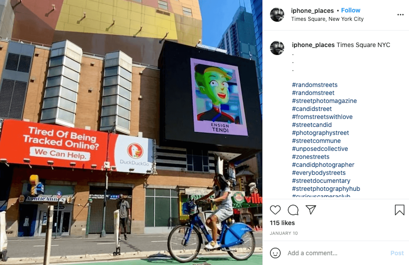 An Instagram screenshot of a woman riding a bicycle in front of several signs on a building.
