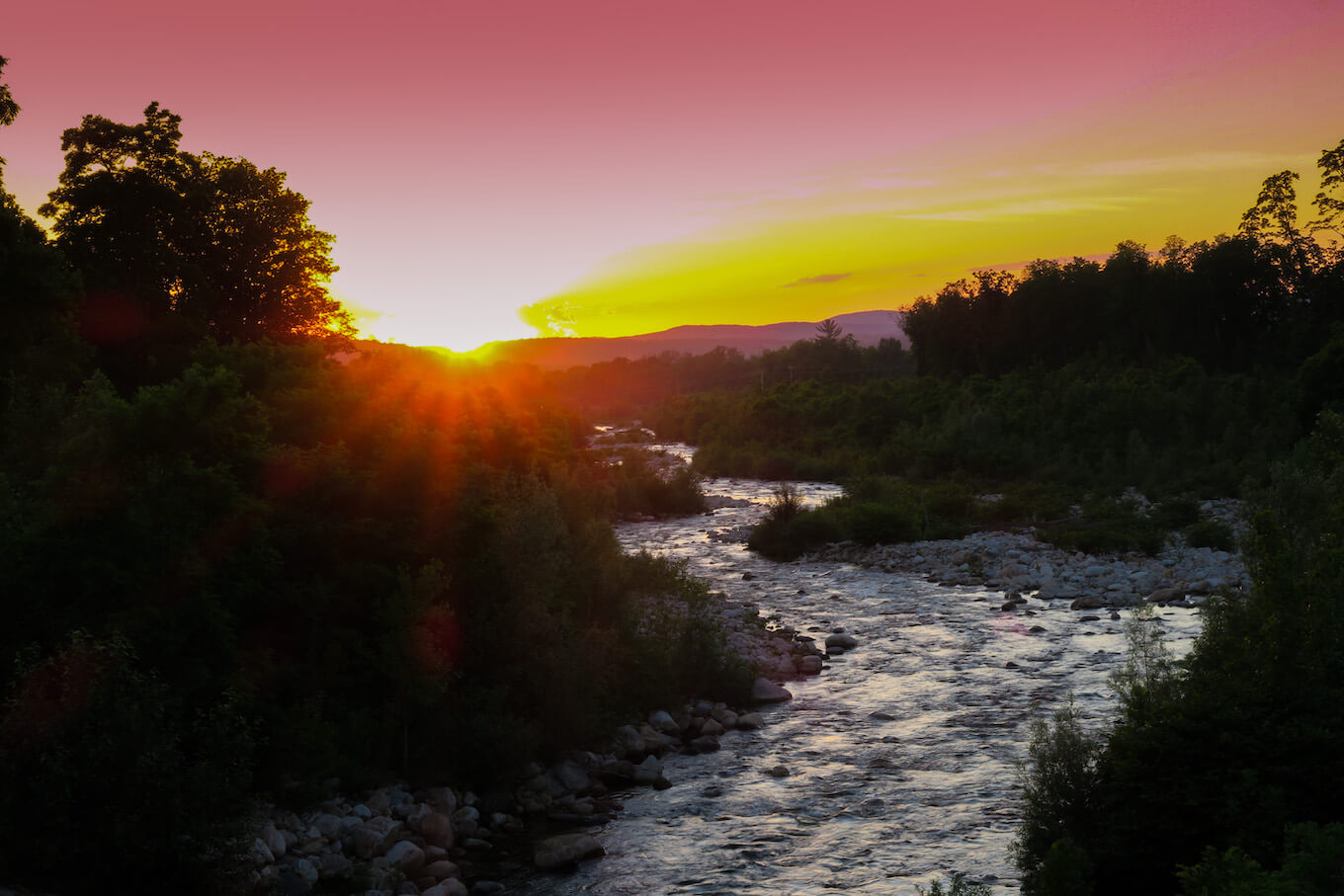 A photo of a sunset demonstrating an underexposed image.