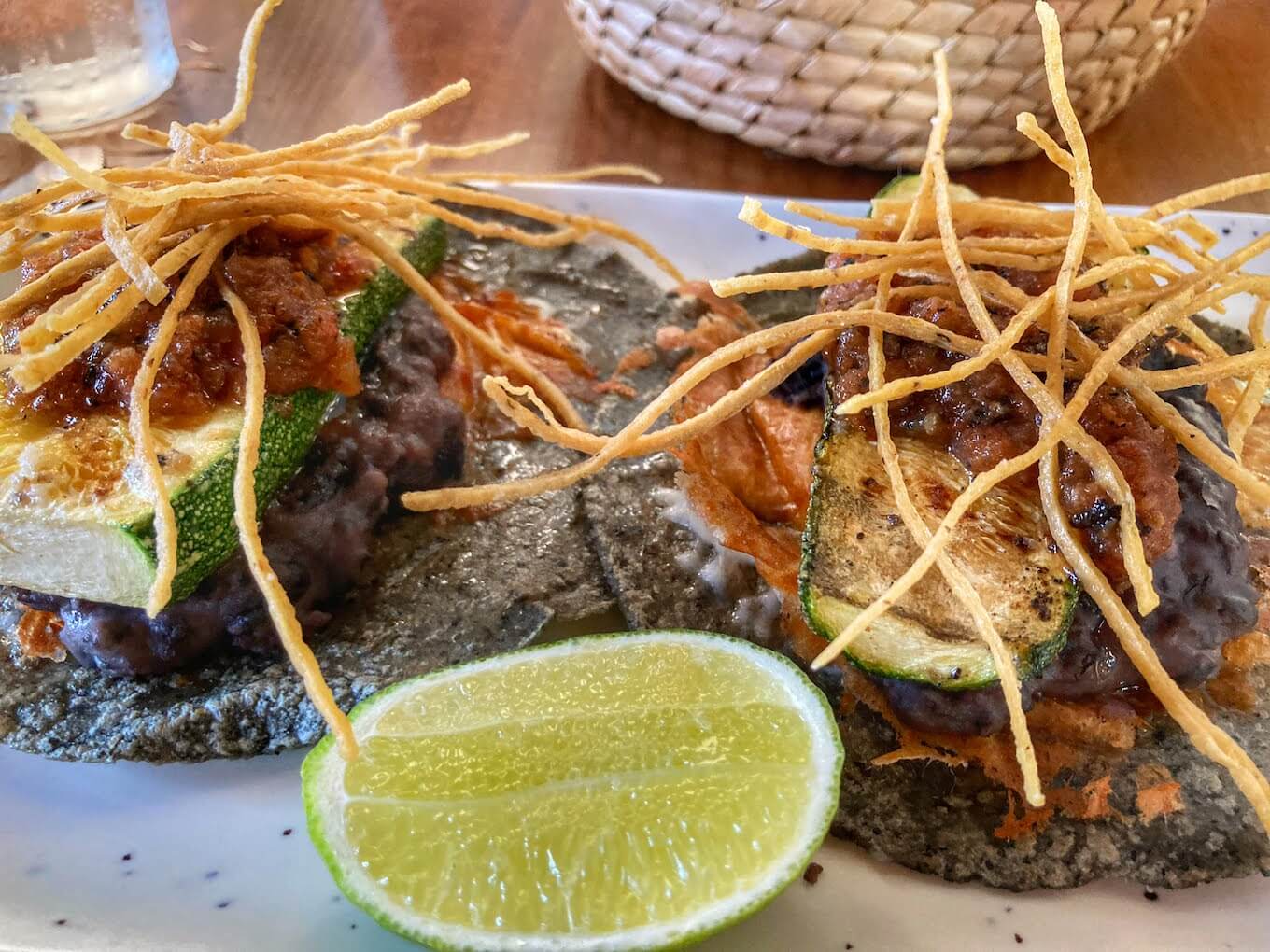 A plate of Mexican food at a restaurant. Food photography is a great example of still life photography.