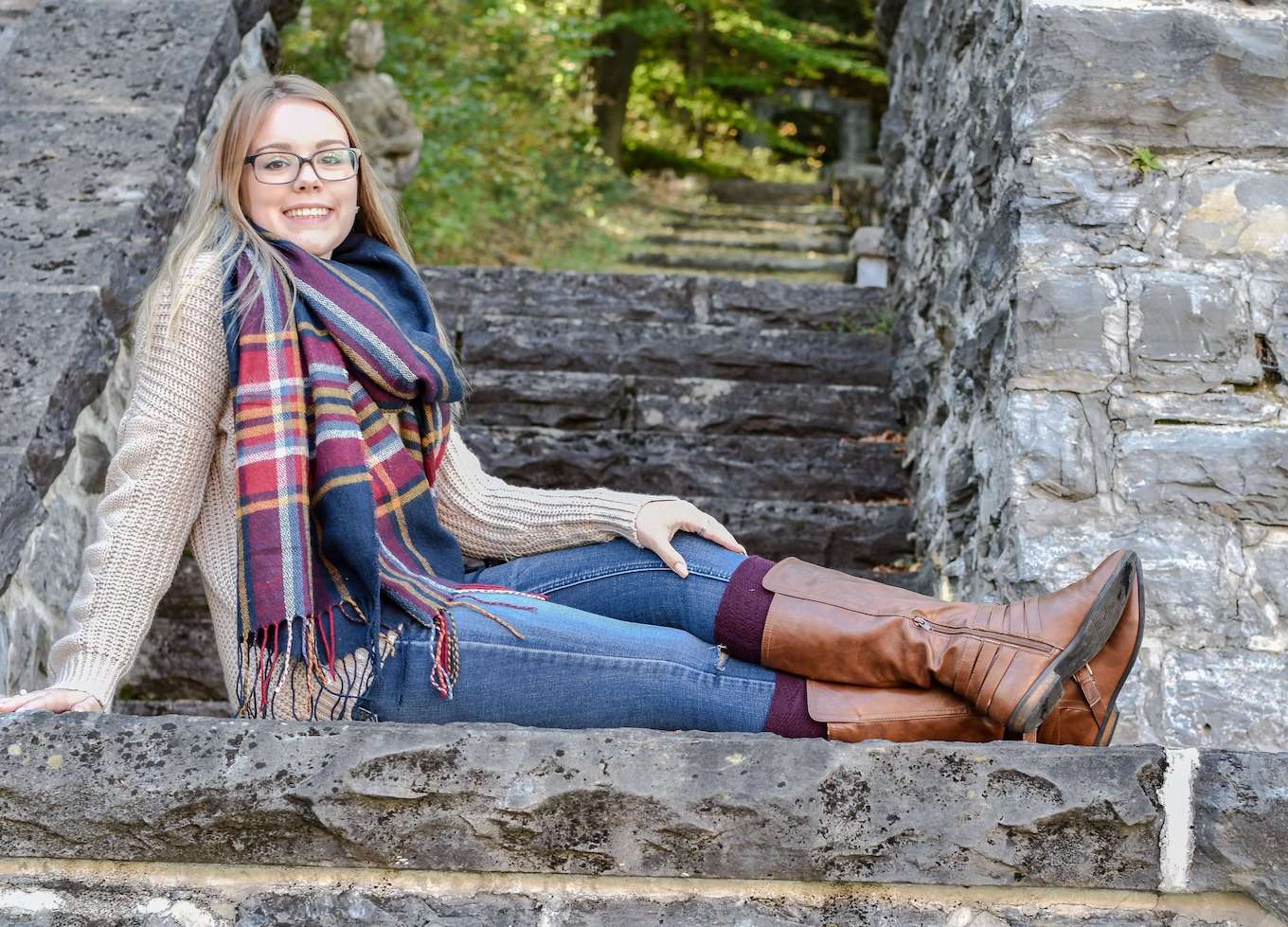 A fall portrait featuring fall fashion items.