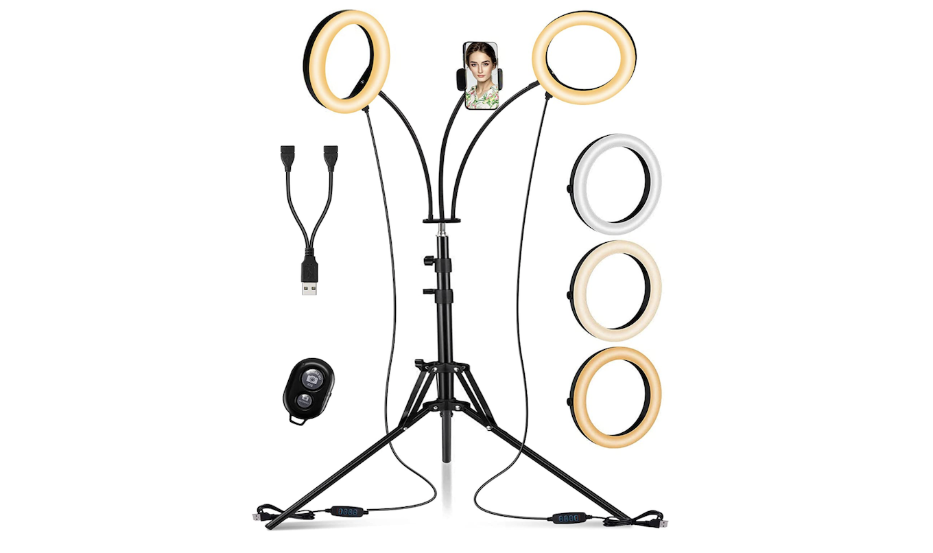 A dual selfie ring light mounted on a tripod.